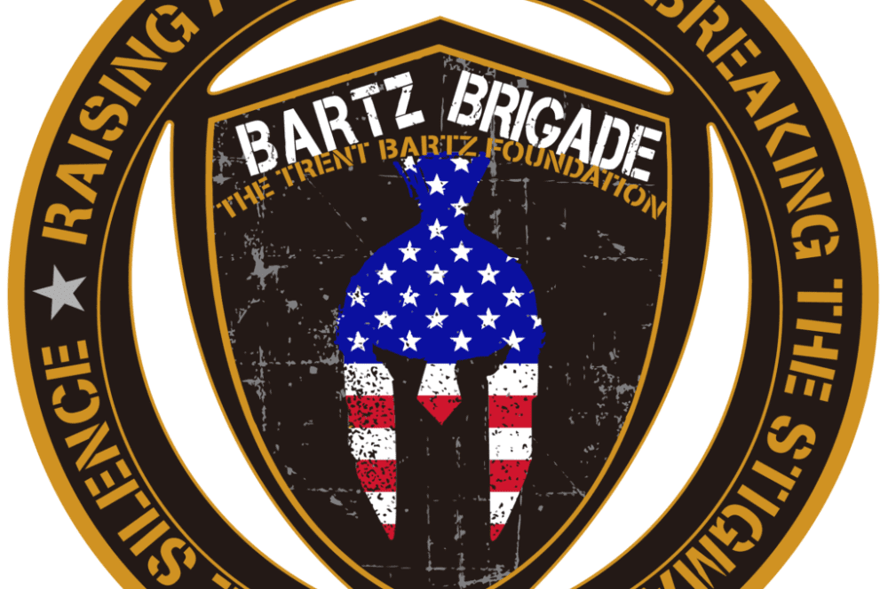 a badge with the words bar7 brigade and an american flag on it